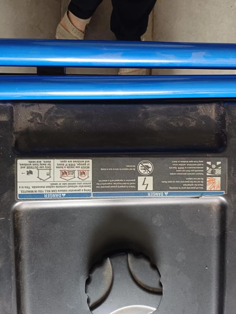 Two technicians inspecting a commercial generator