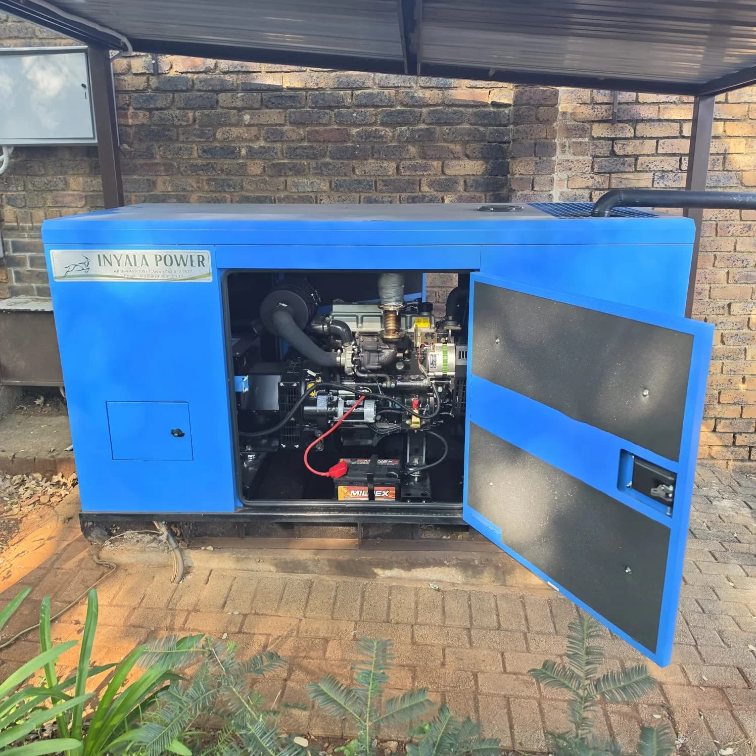 Small portable generator, medium standby set and large industrial generator in one workshop