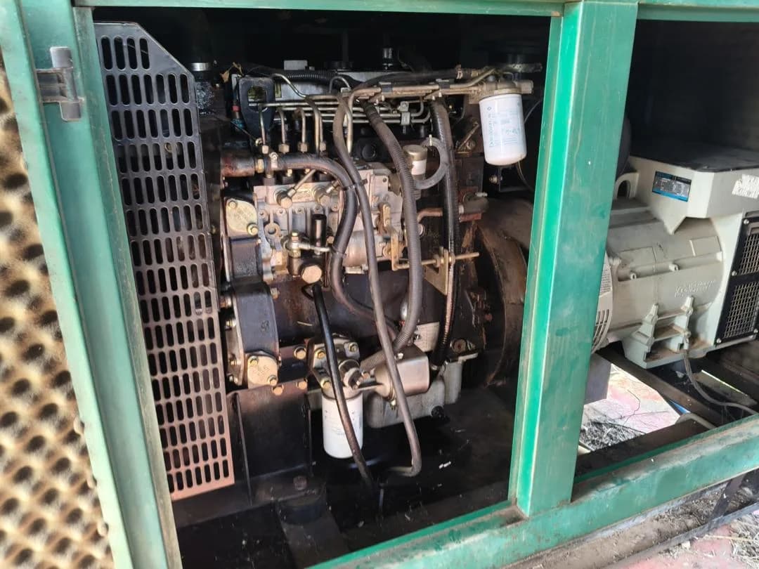 Open diesel generator engine and alternator inside a canopy