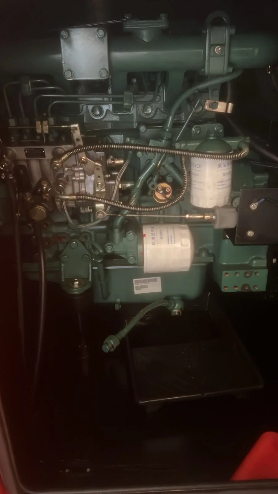 Two technicians inspecting a residential generator