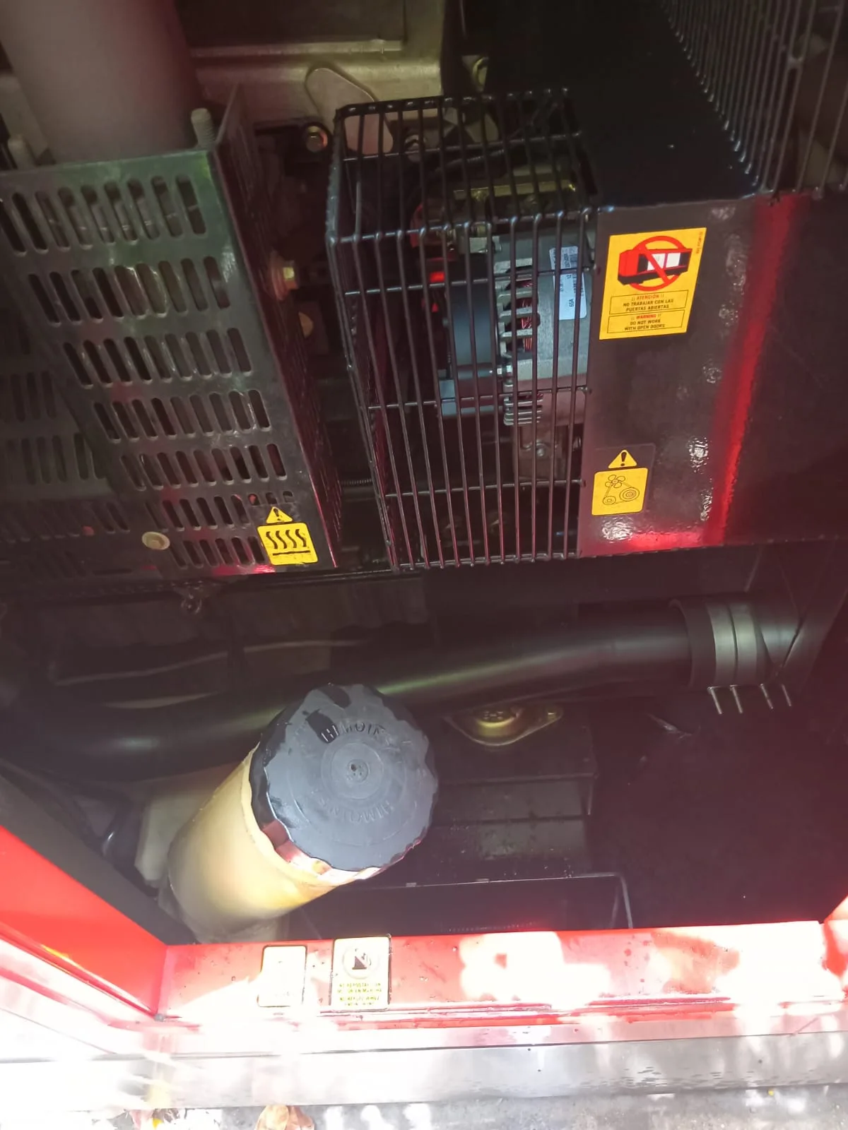 Two technicians checking a home standby generator
