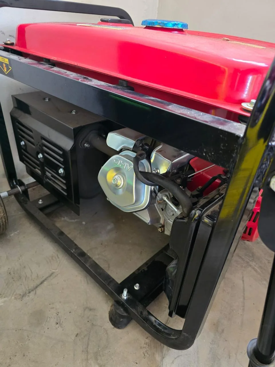 Two technicians servicing a residential standby generator