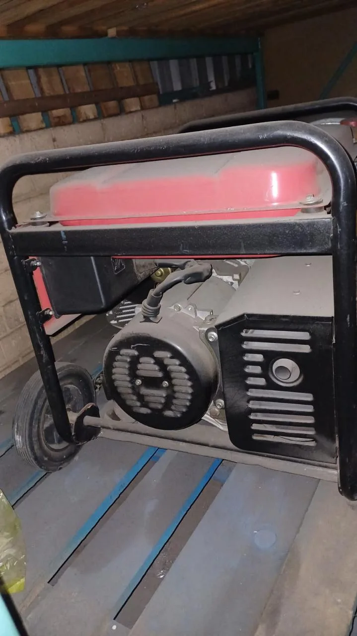Two technicians inspecting a residential generator