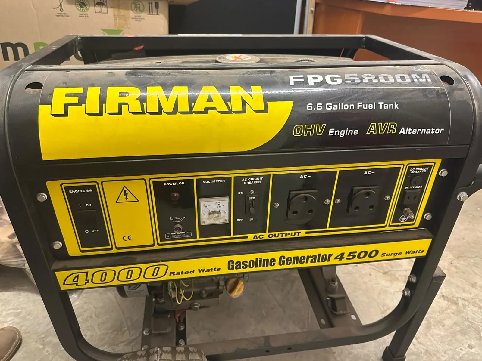 Firman portable petrol generator being inspected